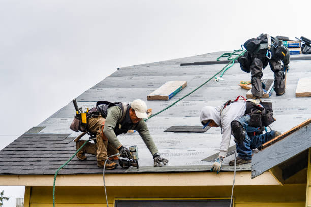 Professional Roofing technician working in Easton, CA